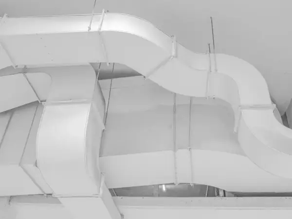 New sheet-metal HVAC ductwork running across a ceiling
