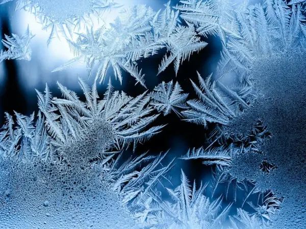Frost crystals on a cold single-pane window